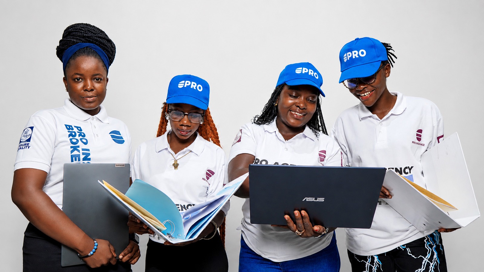 Pro-Insurance advisers reviewing client files and policy paperwork together