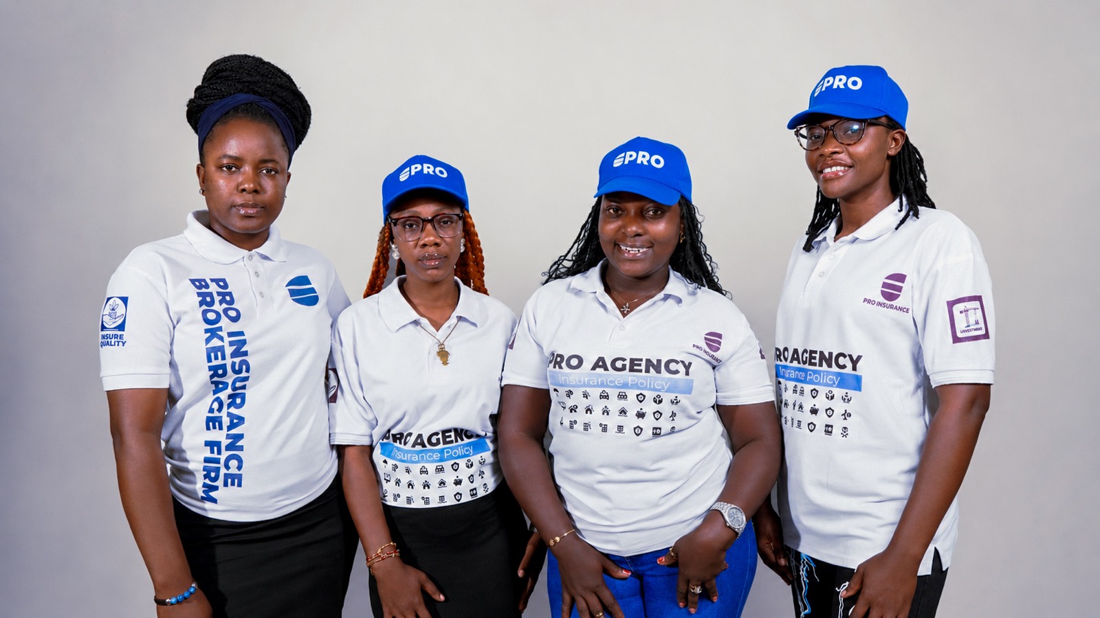Four members of the Pro-Insurance Brokerage Firm team in branded uniform at the firm's Monrovia office