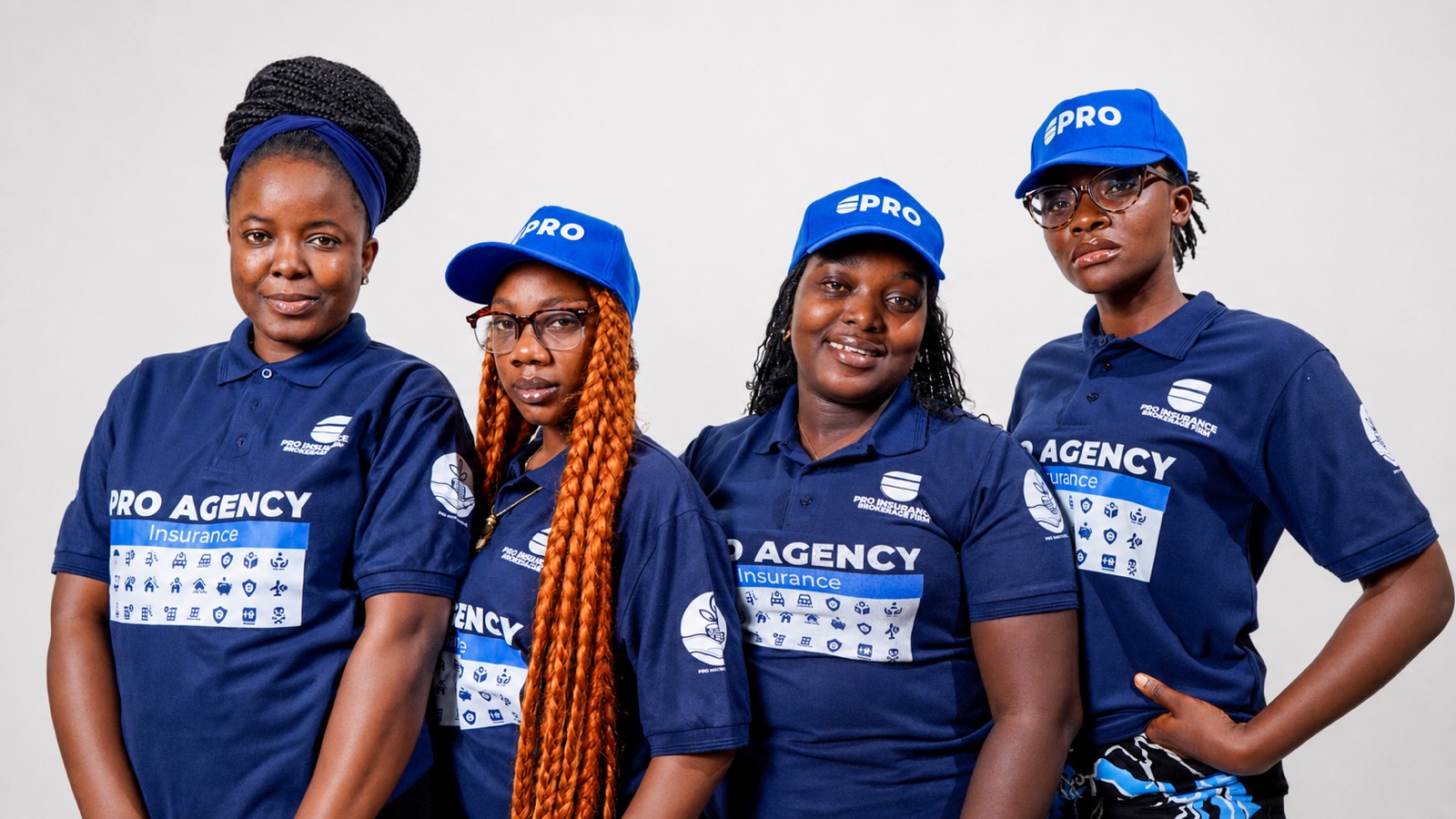 Pro-Insurance colleagues in branded uniform, representing group personal accident cover for organizations